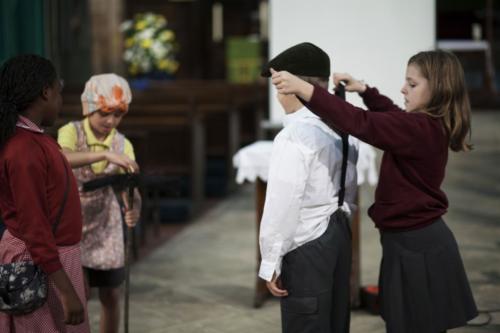 Children from St Augustine's performing the play