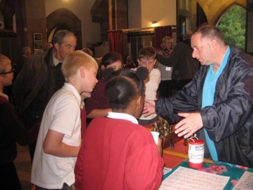 Paul talks to the children from St Augustine's primary
