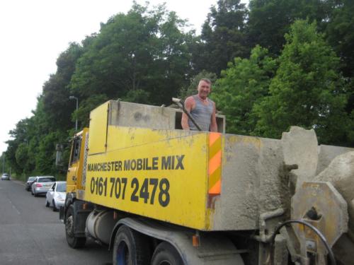 Kenny arrives with the concrete